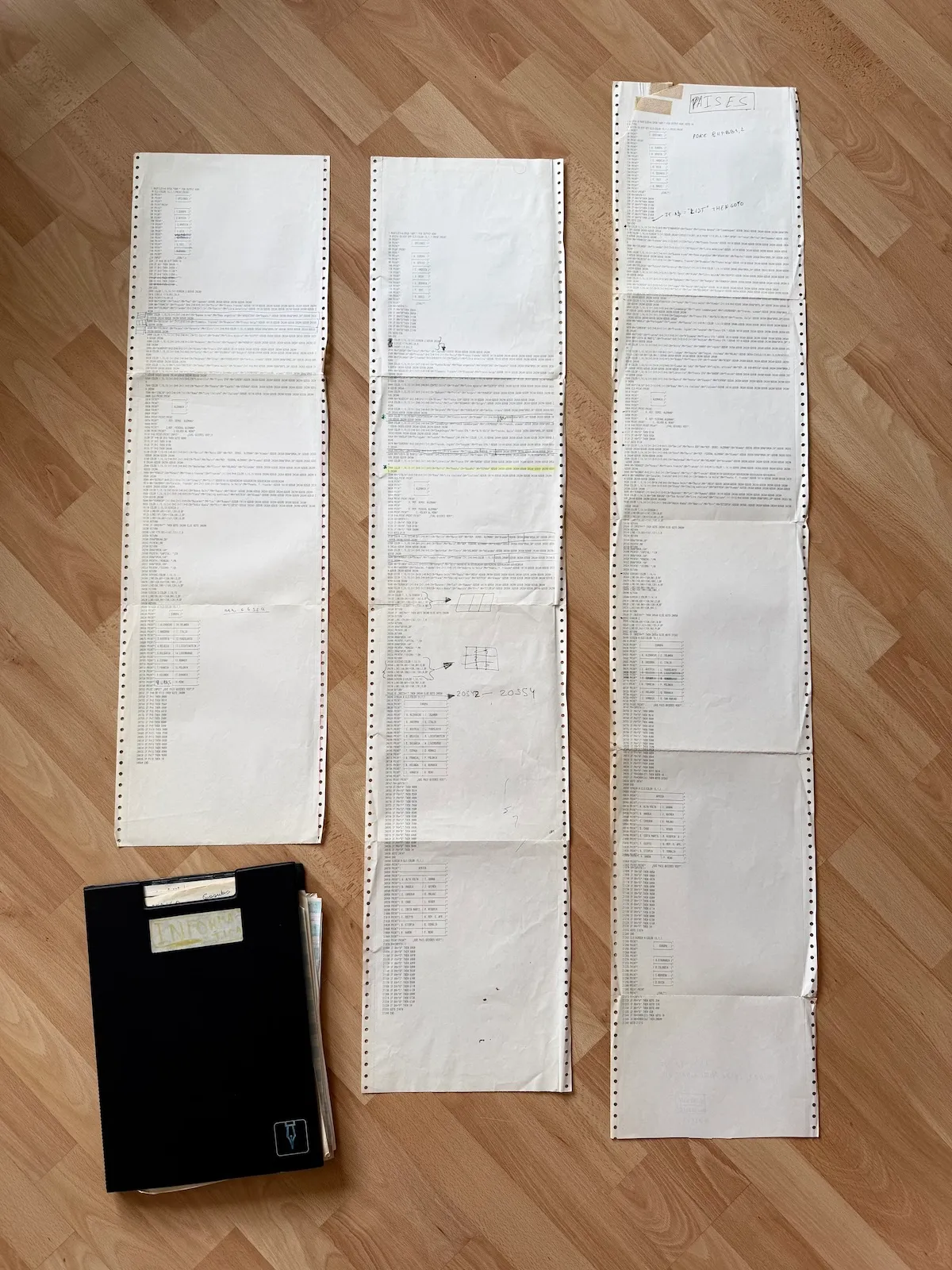 Three versions of a BASIC program printed on perforated dot-matrix paper, showing 1980s computer artifacts.